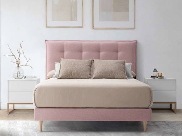 cabecero tapizado rosa-pink en tienda Muebles Valencia